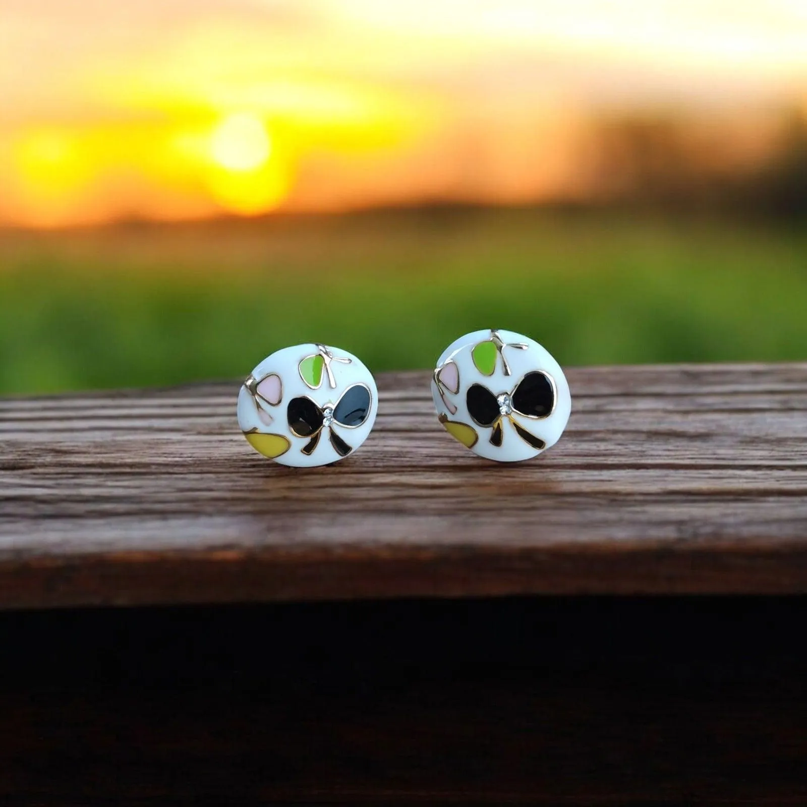 Floral White Stud Earrings with Black Butterfly Motifs