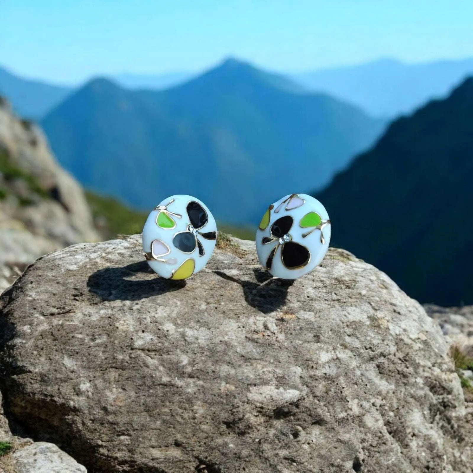 Floral White Stud Earrings with Black Butterfly Motifs